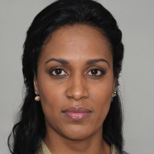 Neutral black young-adult female with medium  black hair and brown eyes