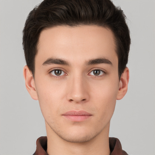 Neutral white young-adult male with short  brown hair and brown eyes