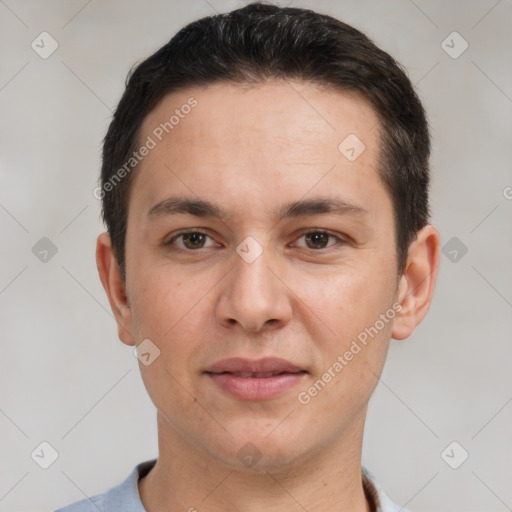 Joyful white young-adult male with short  brown hair and brown eyes