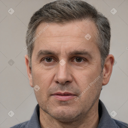 Neutral white adult male with short  brown hair and brown eyes