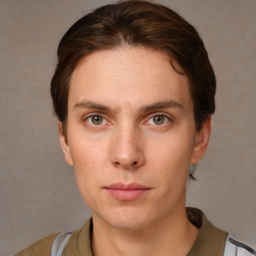 Neutral white young-adult male with short  brown hair and grey eyes