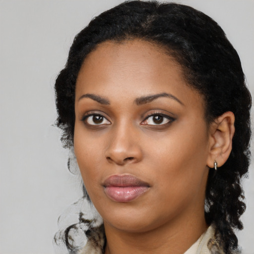 Neutral black young-adult female with long  black hair and brown eyes