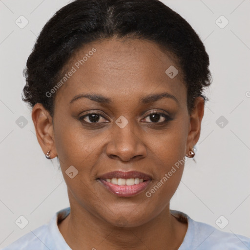 Joyful black young-adult female with short  brown hair and brown eyes