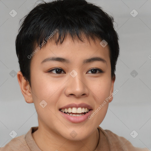 Joyful asian young-adult female with short  brown hair and brown eyes