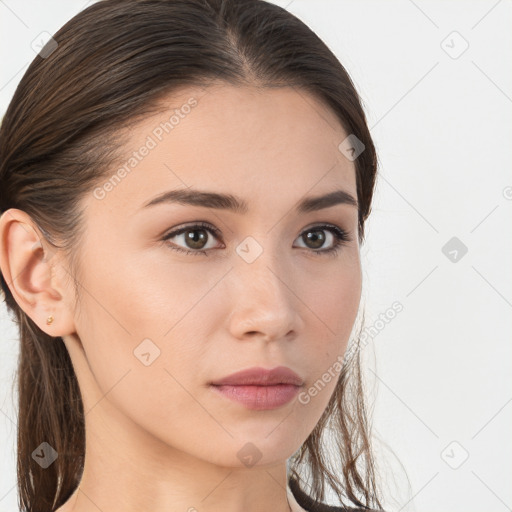 Neutral white young-adult female with long  brown hair and brown eyes