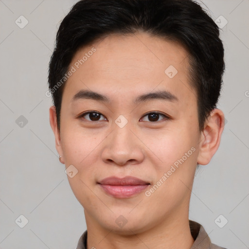 Joyful asian young-adult male with short  brown hair and brown eyes