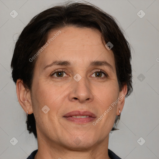 Joyful white adult female with short  brown hair and brown eyes