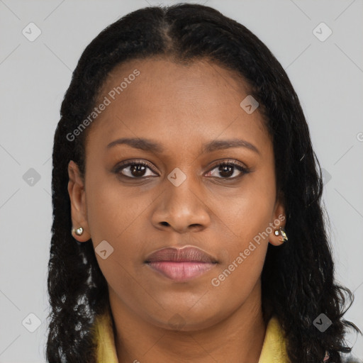 Joyful black young-adult female with long  brown hair and brown eyes