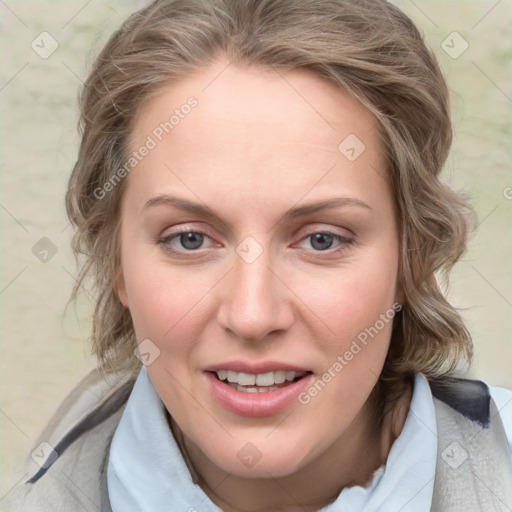 Joyful white young-adult female with medium  brown hair and blue eyes