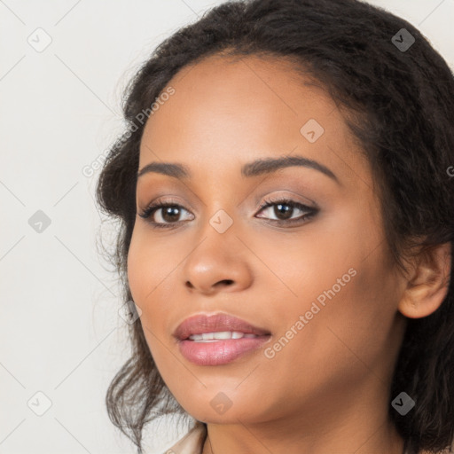 Joyful latino young-adult female with long  black hair and brown eyes