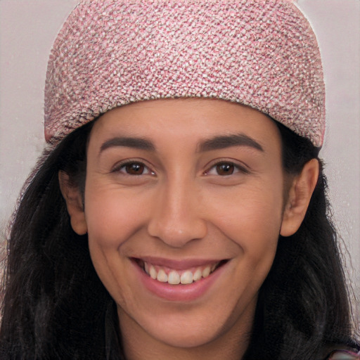 Joyful white young-adult female with long  black hair and brown eyes