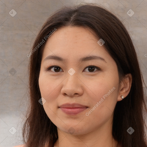 Joyful asian young-adult female with long  brown hair and brown eyes