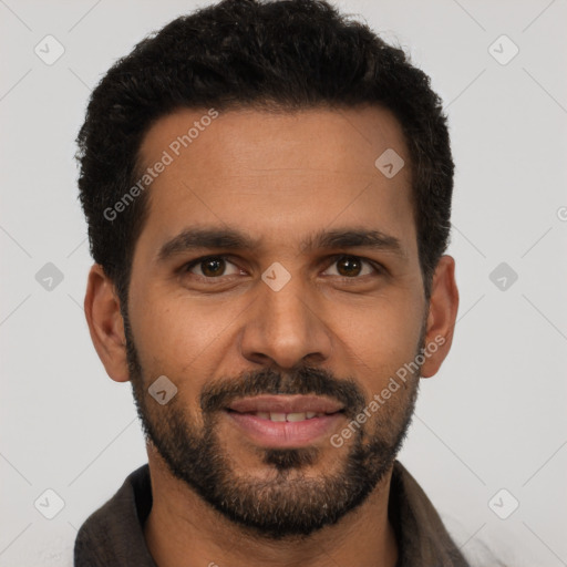 Joyful black young-adult male with short  black hair and brown eyes