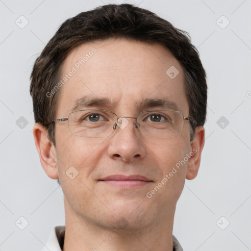 Joyful white adult male with short  brown hair and grey eyes