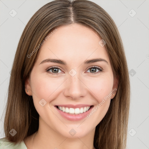 Joyful white young-adult female with long  brown hair and green eyes