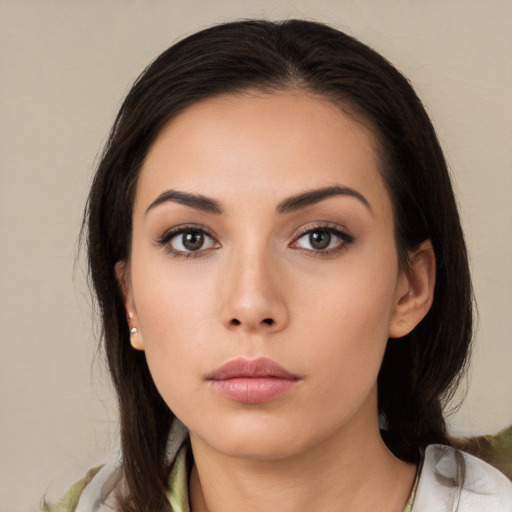 Neutral asian young-adult female with medium  brown hair and brown eyes