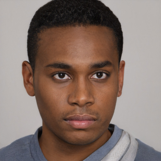 Neutral black young-adult male with short  brown hair and brown eyes
