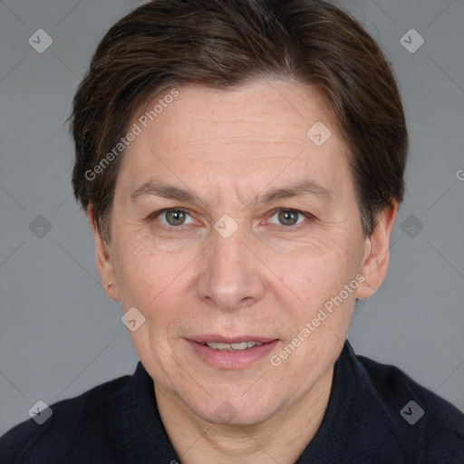 Joyful white adult female with short  brown hair and brown eyes