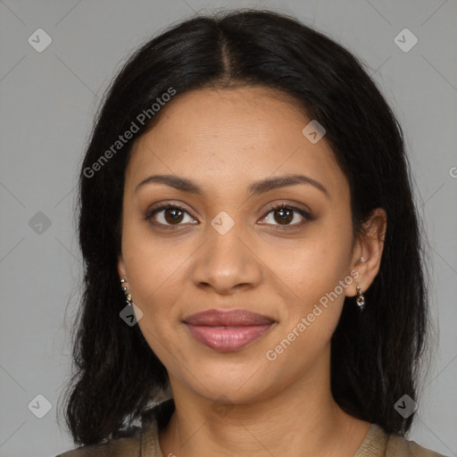 Joyful black young-adult female with long  brown hair and brown eyes