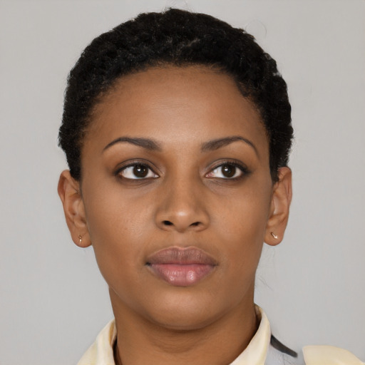 Neutral black young-adult female with short  brown hair and brown eyes