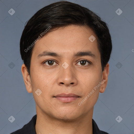 Joyful white young-adult male with short  black hair and brown eyes