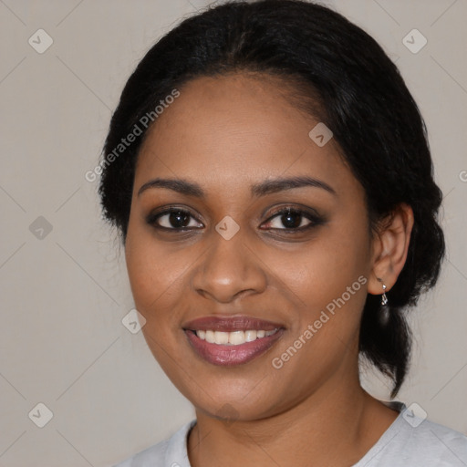 Joyful black young-adult female with medium  black hair and brown eyes