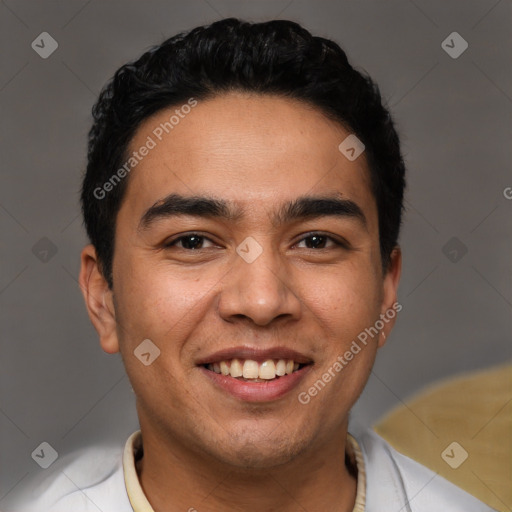 Joyful latino young-adult male with short  black hair and brown eyes