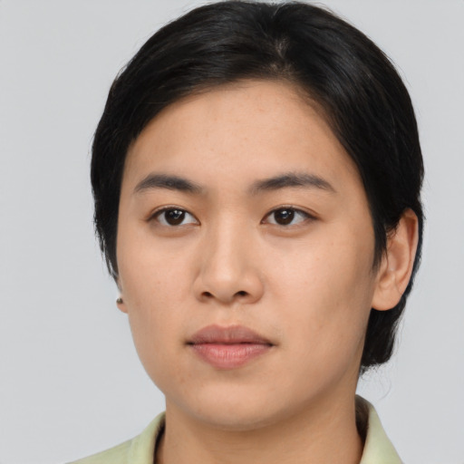 Neutral asian young-adult female with medium  black hair and brown eyes