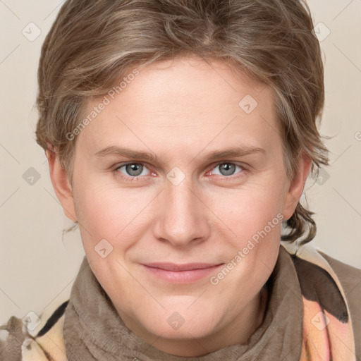 Joyful white young-adult female with medium  brown hair and blue eyes