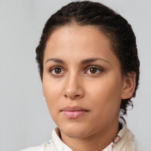 Neutral white young-adult female with medium  brown hair and brown eyes
