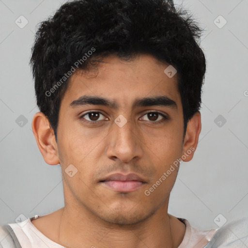 Neutral latino young-adult male with short  brown hair and brown eyes