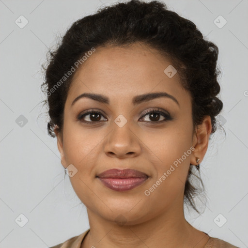 Joyful latino young-adult female with short  brown hair and brown eyes