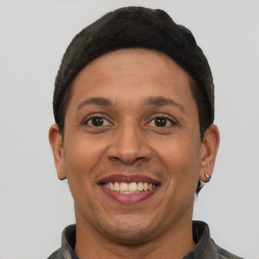 Joyful white adult female with short  black hair and brown eyes