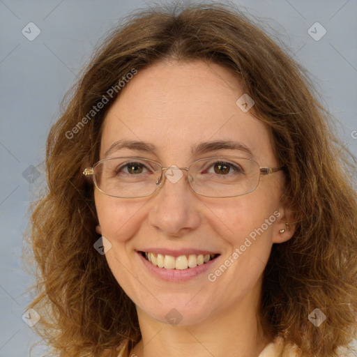 Joyful white adult female with long  brown hair and brown eyes