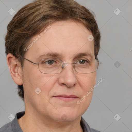 Joyful white adult female with short  brown hair and grey eyes