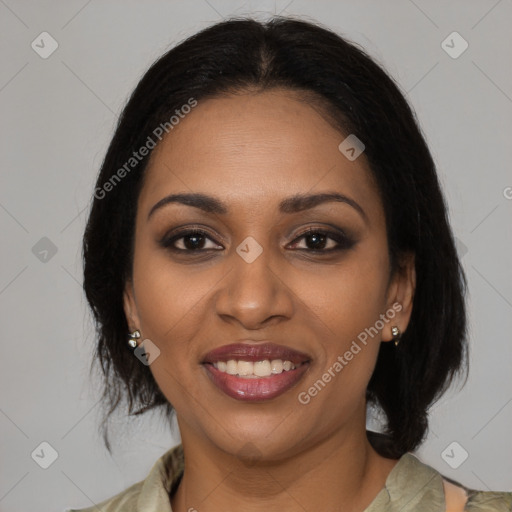 Joyful black young-adult female with medium  brown hair and brown eyes