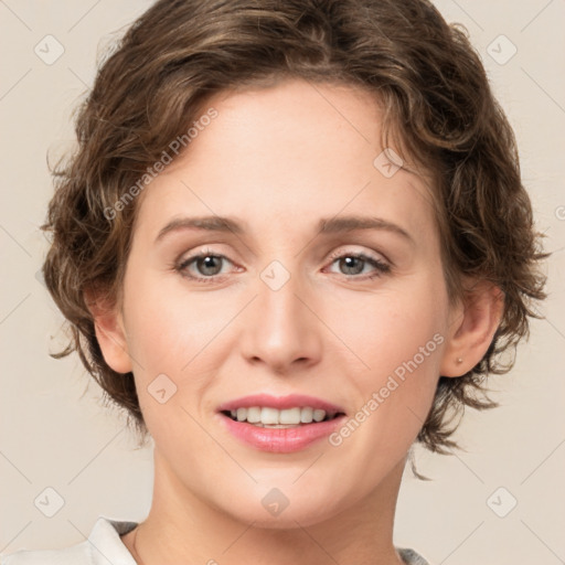 Joyful white young-adult female with medium  brown hair and green eyes