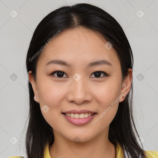 Joyful asian young-adult female with medium  brown hair and brown eyes