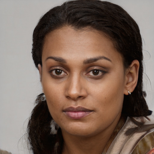 Neutral white young-adult female with long  brown hair and brown eyes