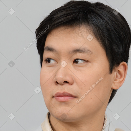 Neutral asian young-adult male with short  black hair and brown eyes