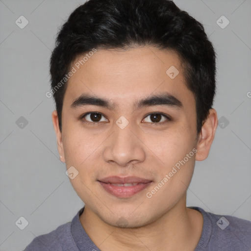 Joyful white young-adult male with short  black hair and brown eyes