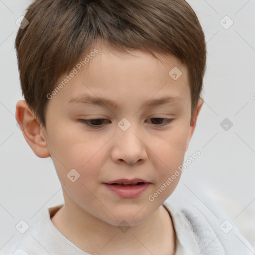 Joyful white child male with short  brown hair and brown eyes