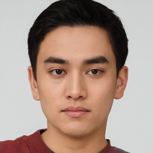 Neutral white young-adult male with short  black hair and brown eyes