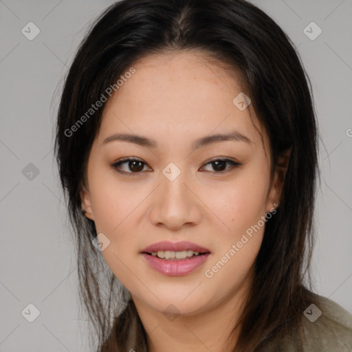 Joyful asian young-adult female with long  brown hair and brown eyes