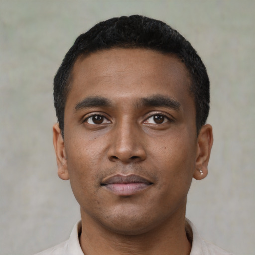Neutral black young-adult male with short  black hair and brown eyes