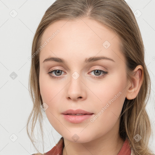 Neutral white young-adult female with medium  brown hair and grey eyes