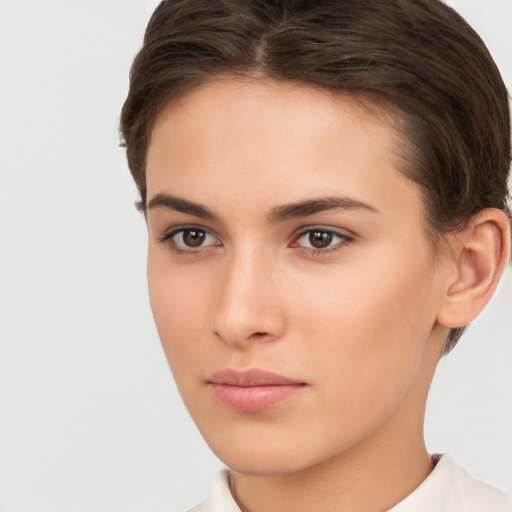 Neutral white young-adult female with short  brown hair and brown eyes