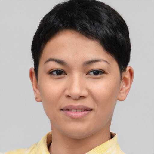 Joyful asian young-adult female with short  black hair and brown eyes