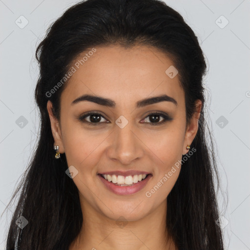 Joyful latino young-adult female with long  brown hair and brown eyes