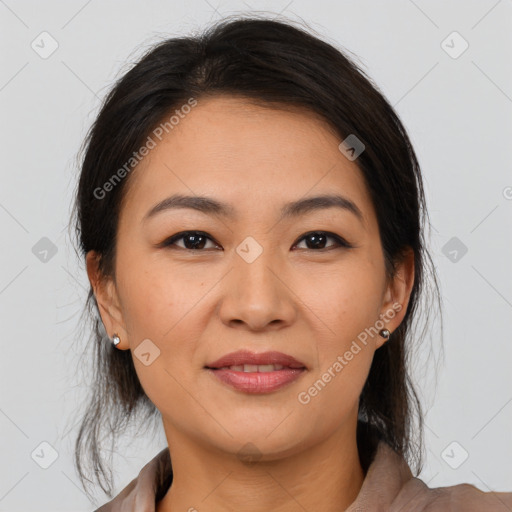 Joyful latino young-adult female with medium  brown hair and brown eyes